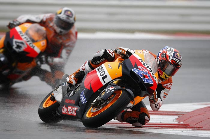 Casey Stoner, Jorge Silverstone  MotoGP action photo